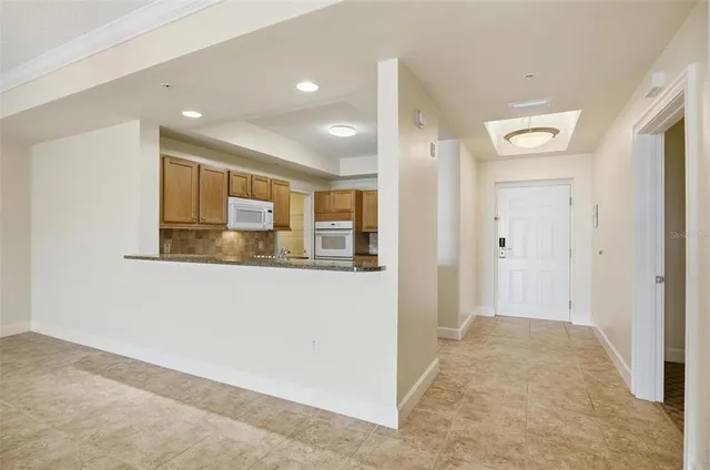 a view of hallway with livingroom