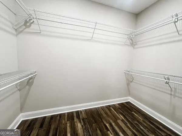 a view of a room with racks on the wall