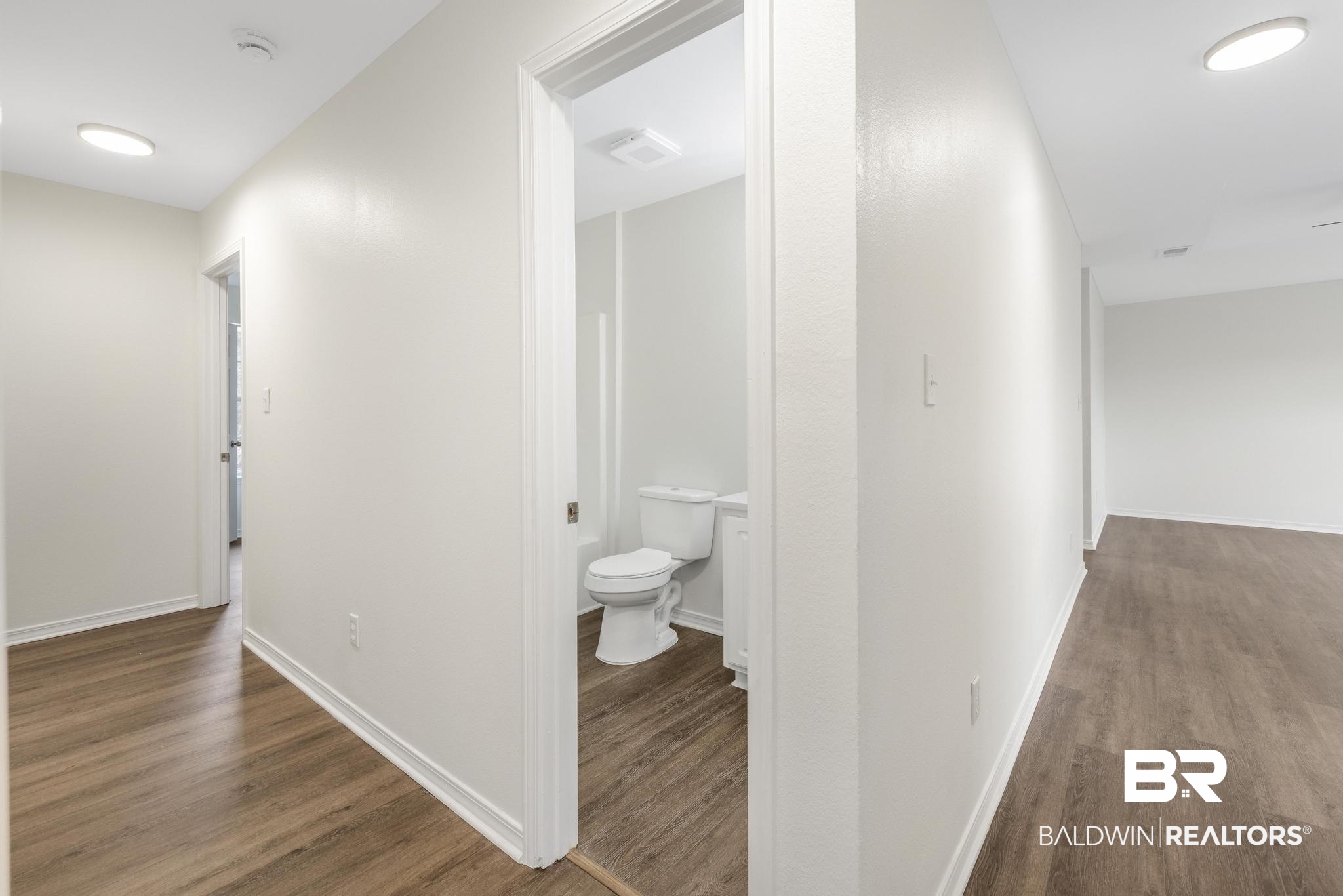 16330 Absalom Street Foley, AL 36535 - Photo 29 of 42 Corridor with hardwood / wood-style floors