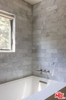 a bathroom with a bathtub