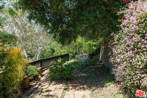 a view of balcony with wooden floor and outdoor space