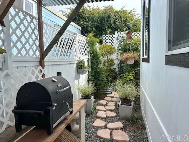 699 North Vulcan Avenue, Unit 80 Encinitas, CA 92024 - Photo 23 of 27 a view of entryway with wooden floor