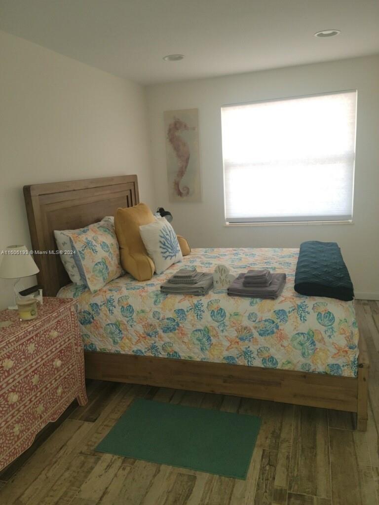 3201 Canal Drive, Unit 2 Pompano Beach, FL 33062 - Photo 12 of 12 a bedroom with a bed and a window