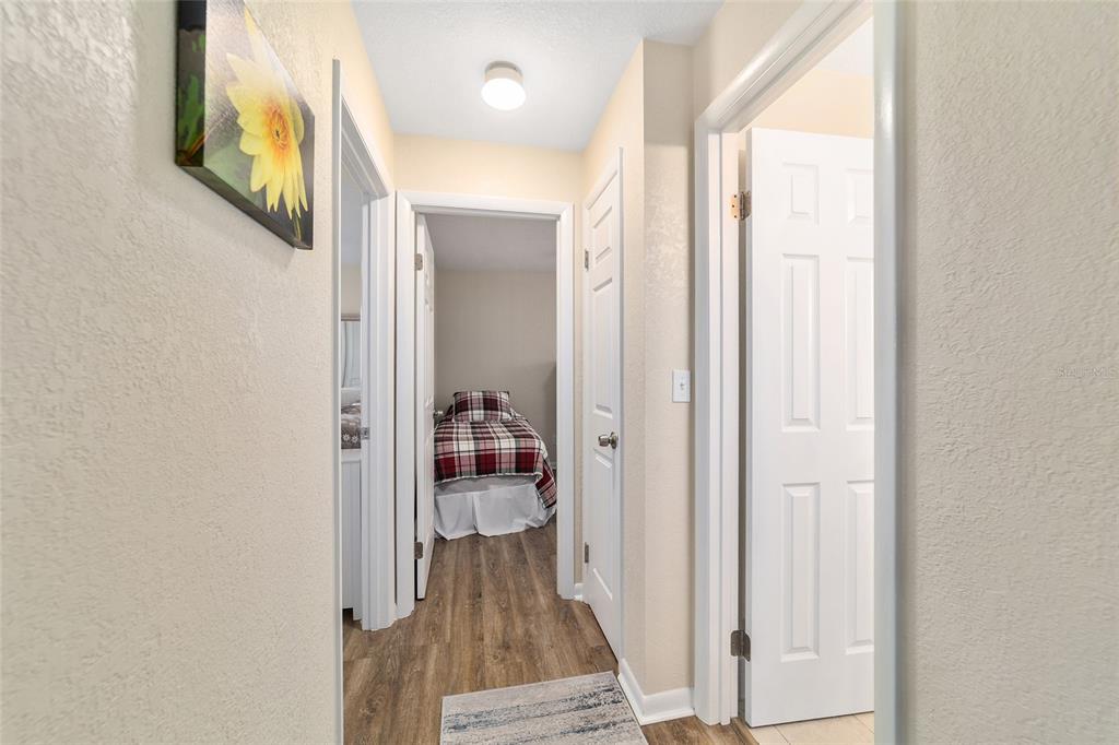 21529 Southwest Honeysuckle Street Dunnellon, FL 34431 - Photo 22 of 55 a view of a bathroom from a hallway