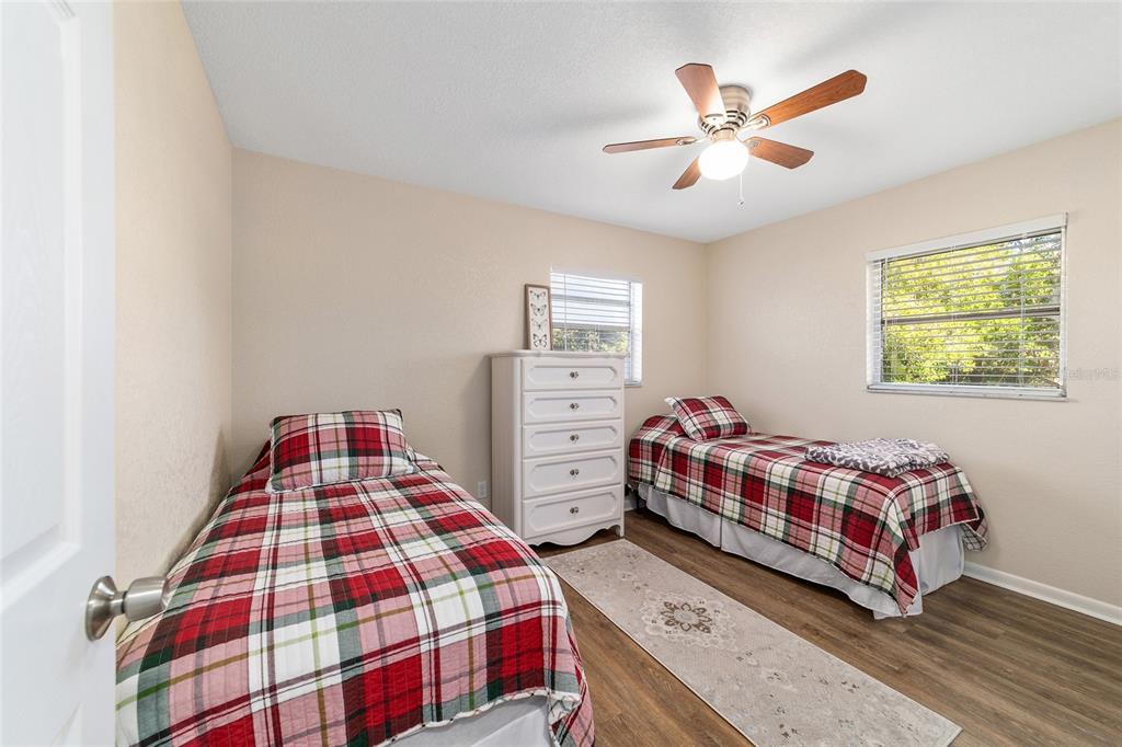 21529 Southwest Honeysuckle Street Dunnellon, FL 34431 - Photo 25 of 55 a bedroom with a bed and window