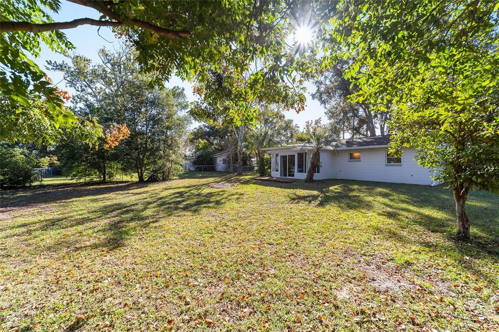 21529 Southwest Honeysuckle Street Dunnellon, FL 34431 - Photo 35 of 55 a view of a swimming pool with an outdoor space