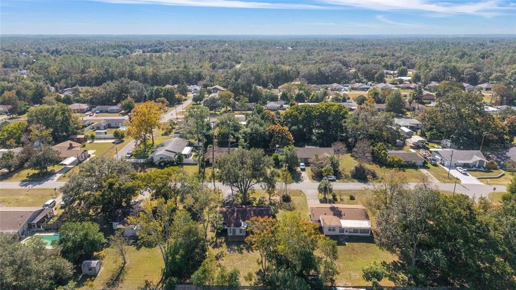 21529 Southwest Honeysuckle Street Dunnellon, FL 34431 - Photo 48 of 55 an aerial view of a city with lots of residential buildings
