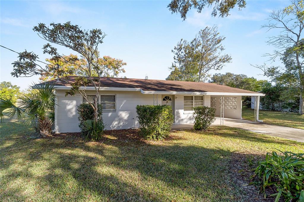 21529 Southwest Honeysuckle Street Dunnellon, FL 34431 - Photo 7 of 55 a view of a house with outdoor space