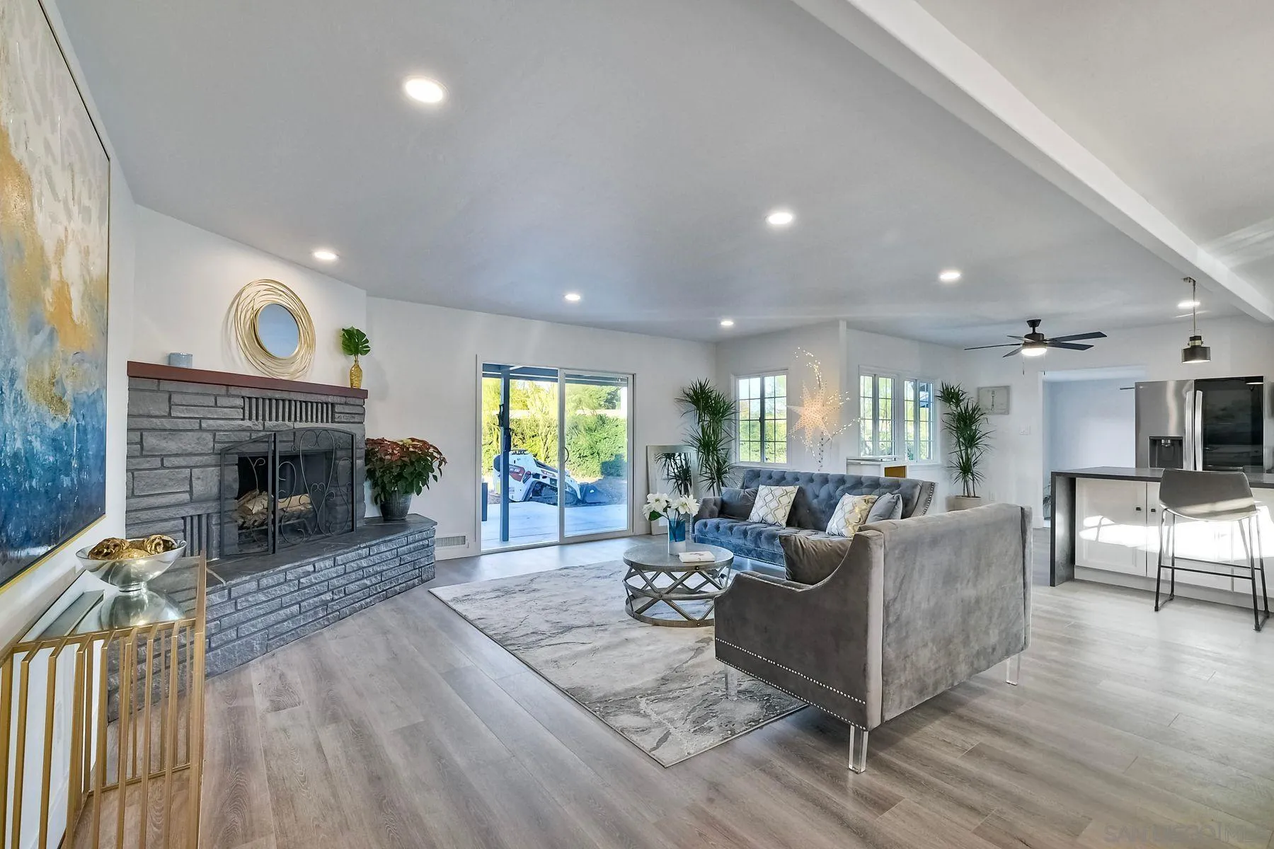 730 Montview Drive Escondido, CA 92025 - Photo 11 of 47 a living room with fireplace furniture and a wooden floor