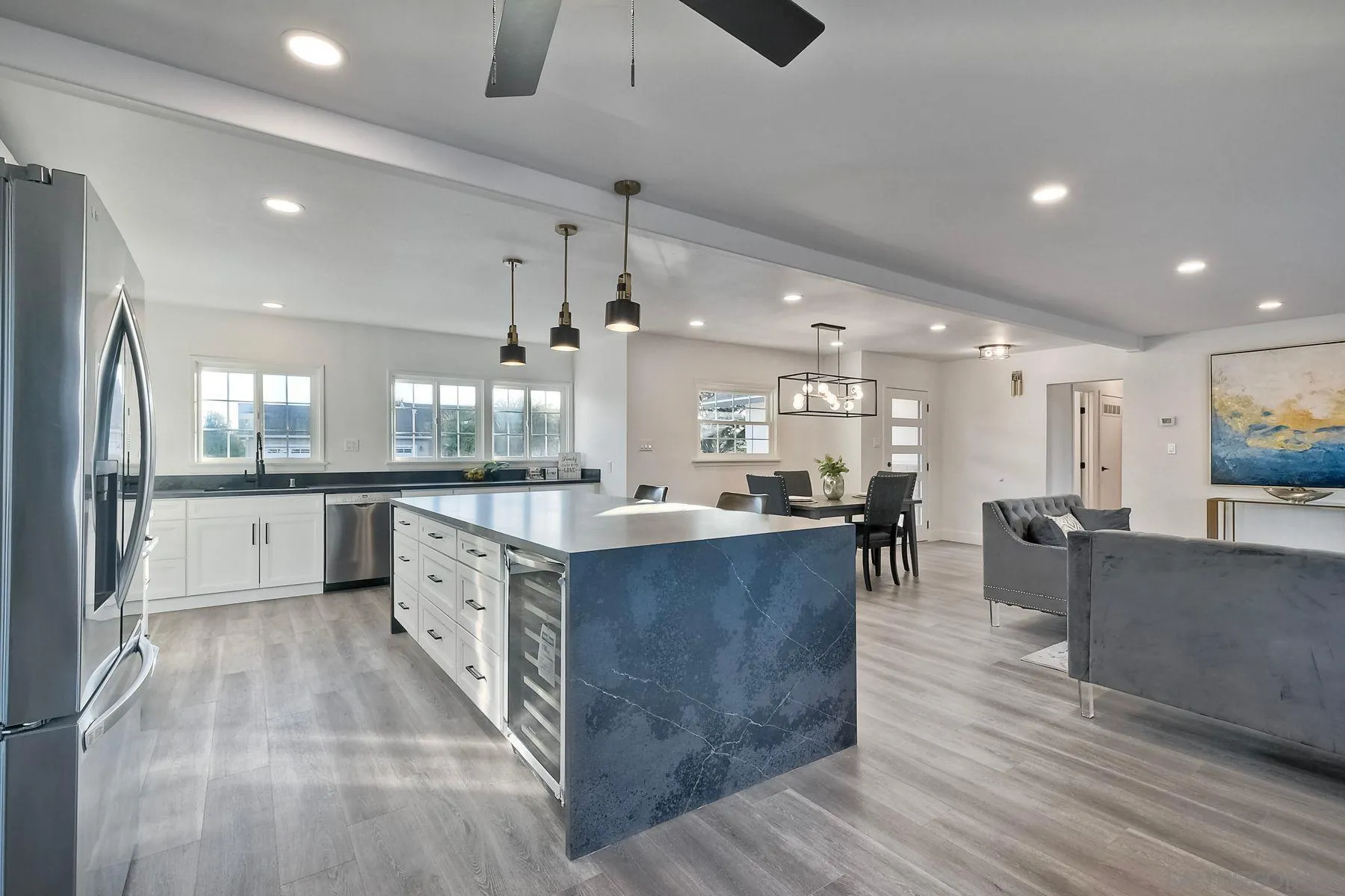 730 Montview Drive Escondido, CA 92025 - Photo 16 of 47 a large kitchen with stainless steel appliances kitchen island a large counter top and a view of living room