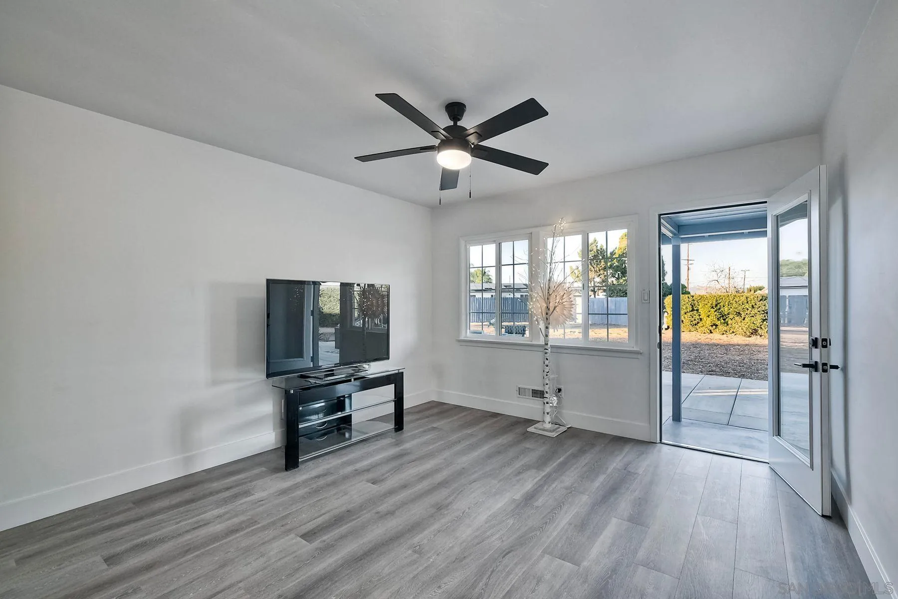 730 Montview Drive Escondido, CA 92025 - Photo 20 of 47 a living room with furniture and a wooden floor