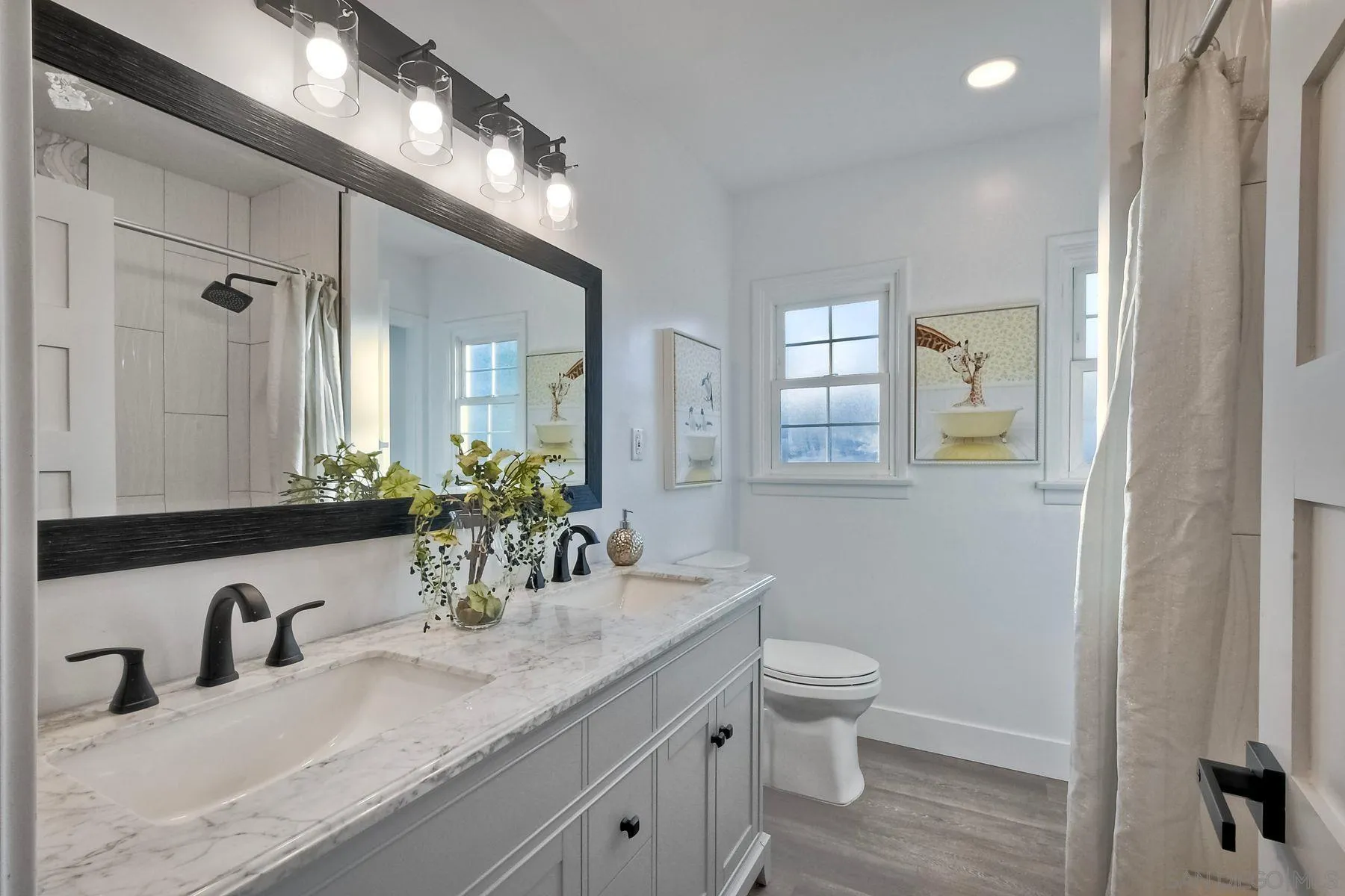 730 Montview Drive Escondido, CA 92025 - Photo 25 of 47 a bathroom with a granite countertop sink a toilet and a mirror