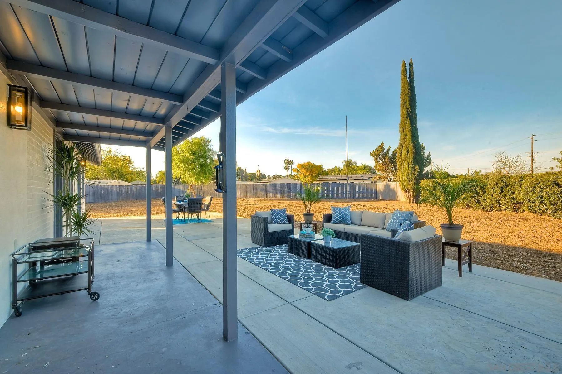 730 Montview Drive Escondido, CA 92025 - Photo 36 of 47 a living room with couches chairs and a floor to ceiling window with a floor to ceiling window