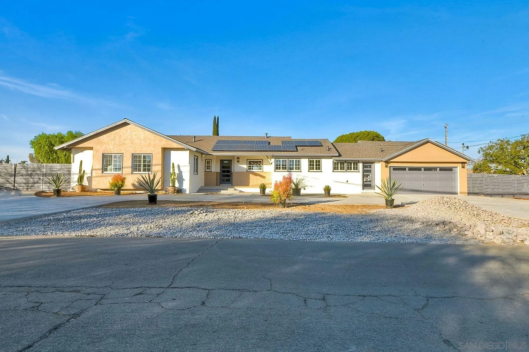 730 Montview Drive Escondido, CA 92025 - Photo 5 of 47 a front view of a house with a yard