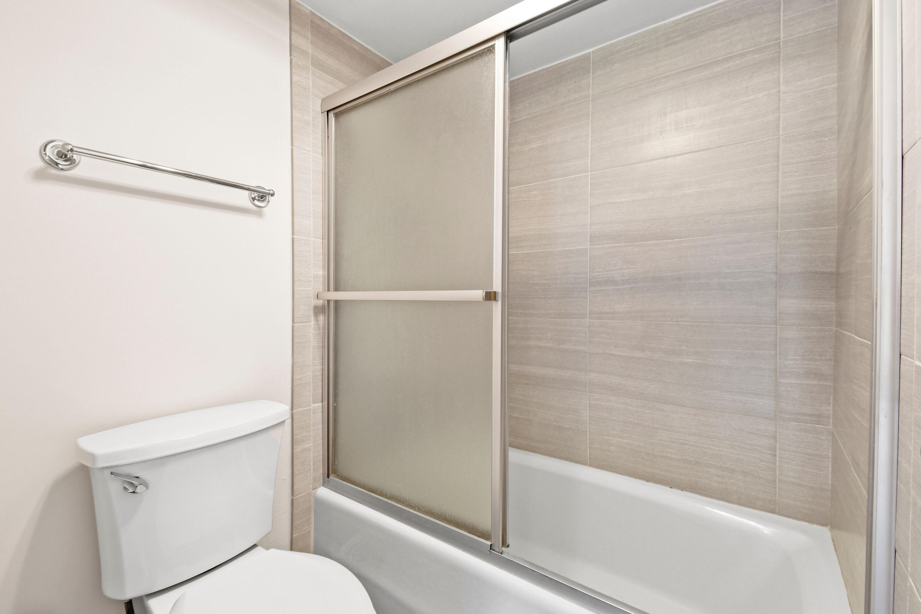 396 Golfview Road, Unit E North Palm Beach, FL 33408 - Photo 20 of 45 a bathroom with a shower and a toilet