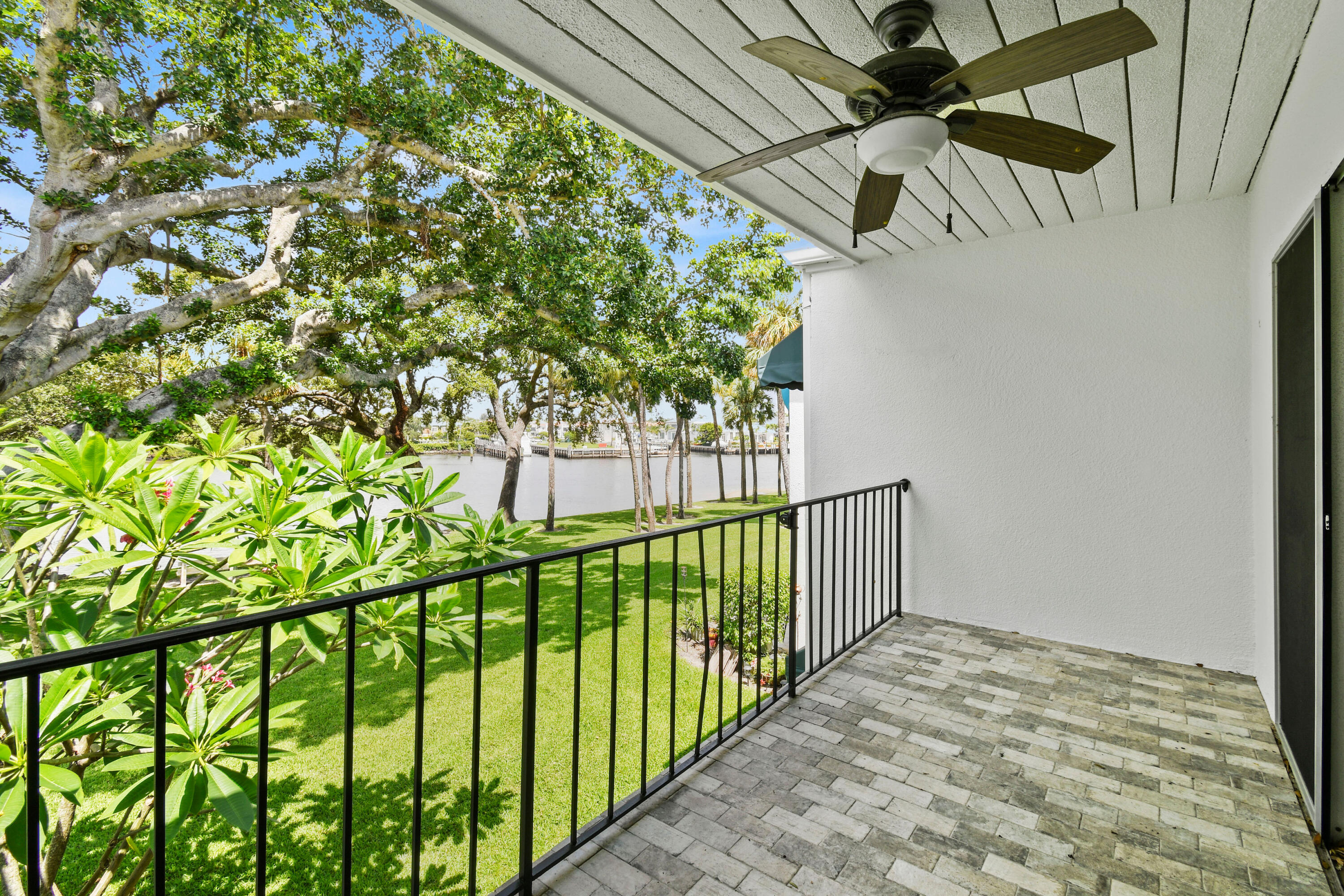 396 Golfview Road, Unit E North Palm Beach, FL 33408 - Photo 22 of 45 a view of a backyard