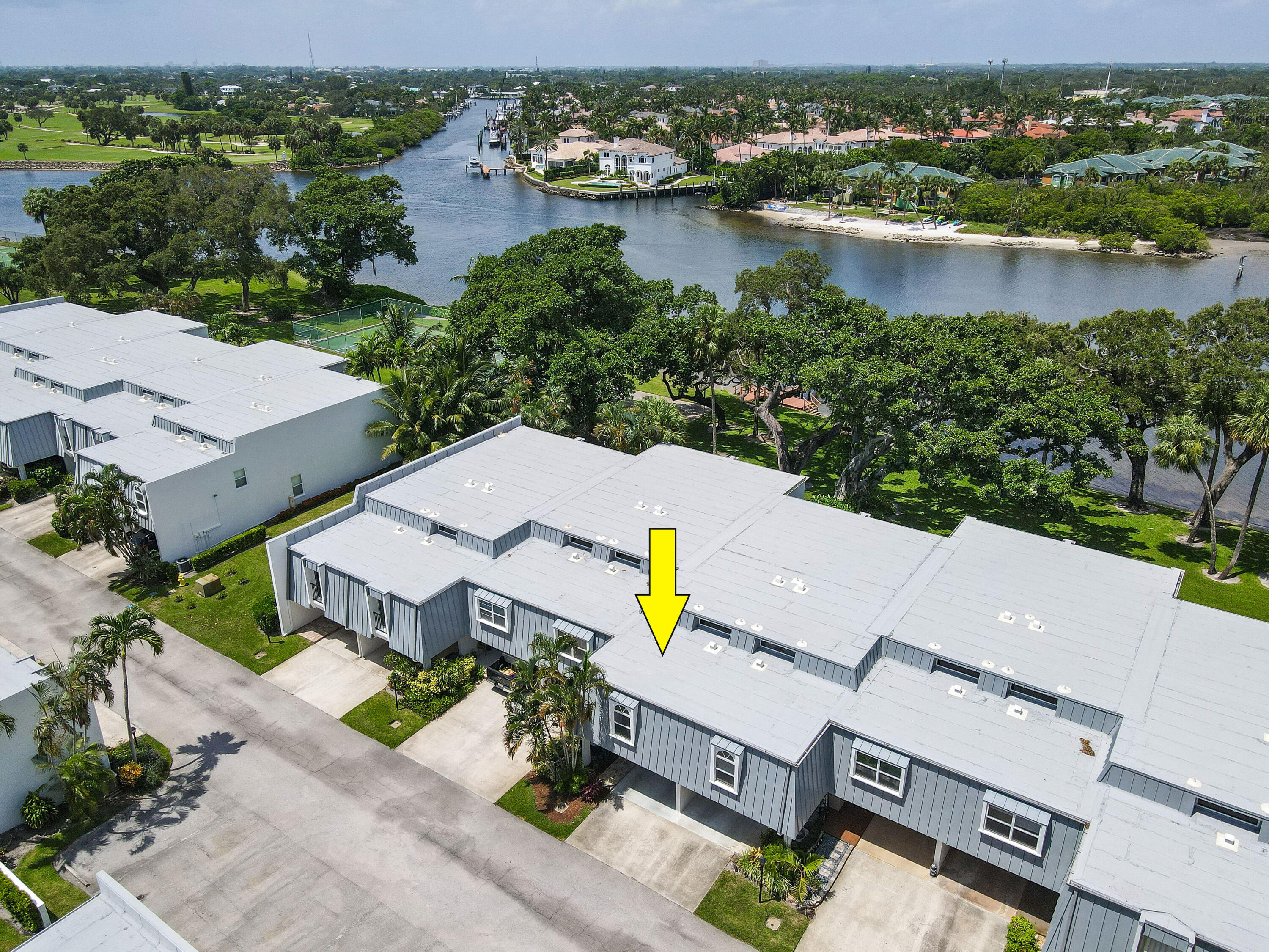 396 Golfview Road, Unit E North Palm Beach, FL 33408 - Photo 34 of 45 an aerial view of a house with a lake view