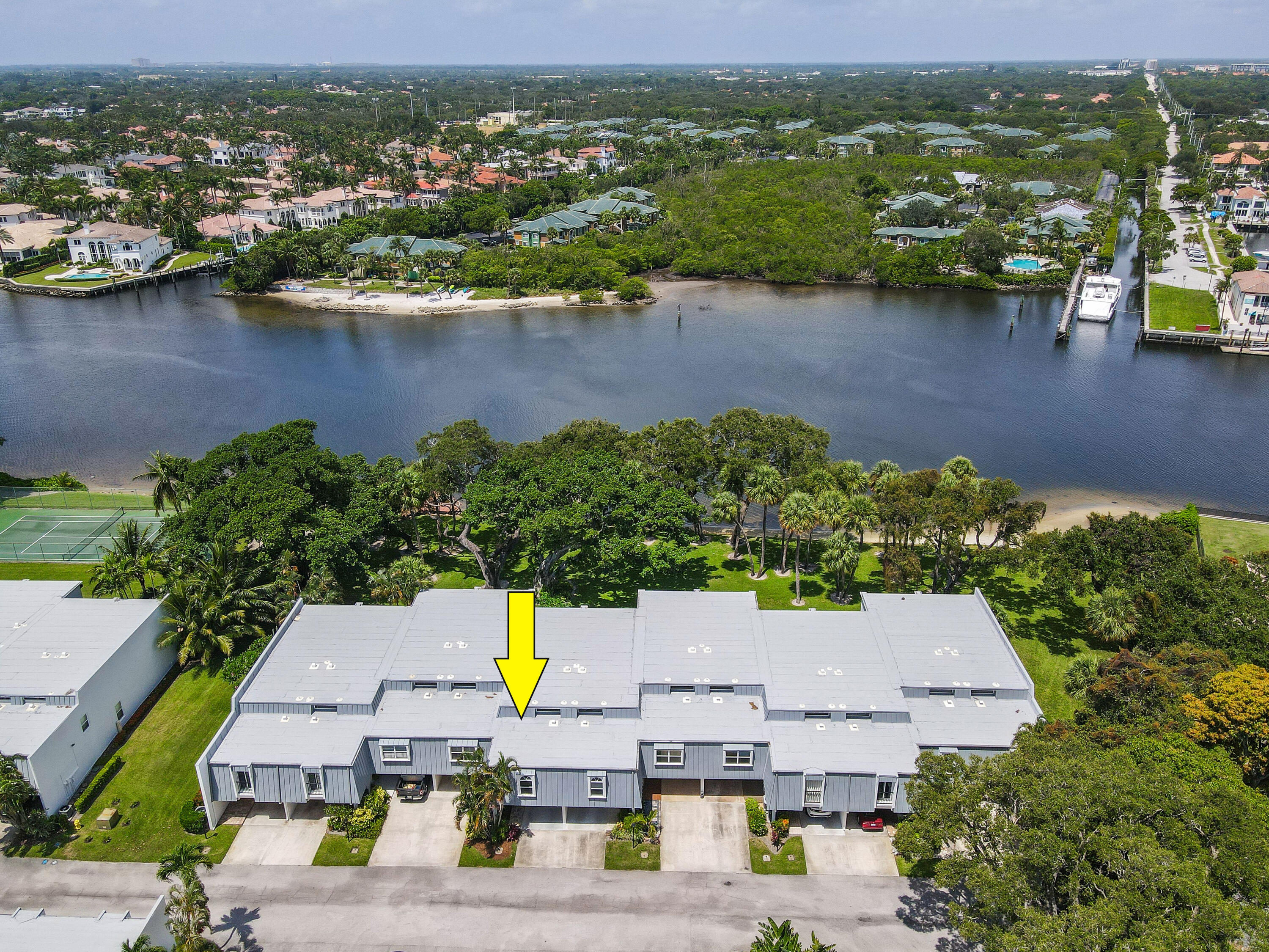 396 Golfview Road, Unit E North Palm Beach, FL 33408 - Photo 35 of 45 an aerial view of a house with a lake view