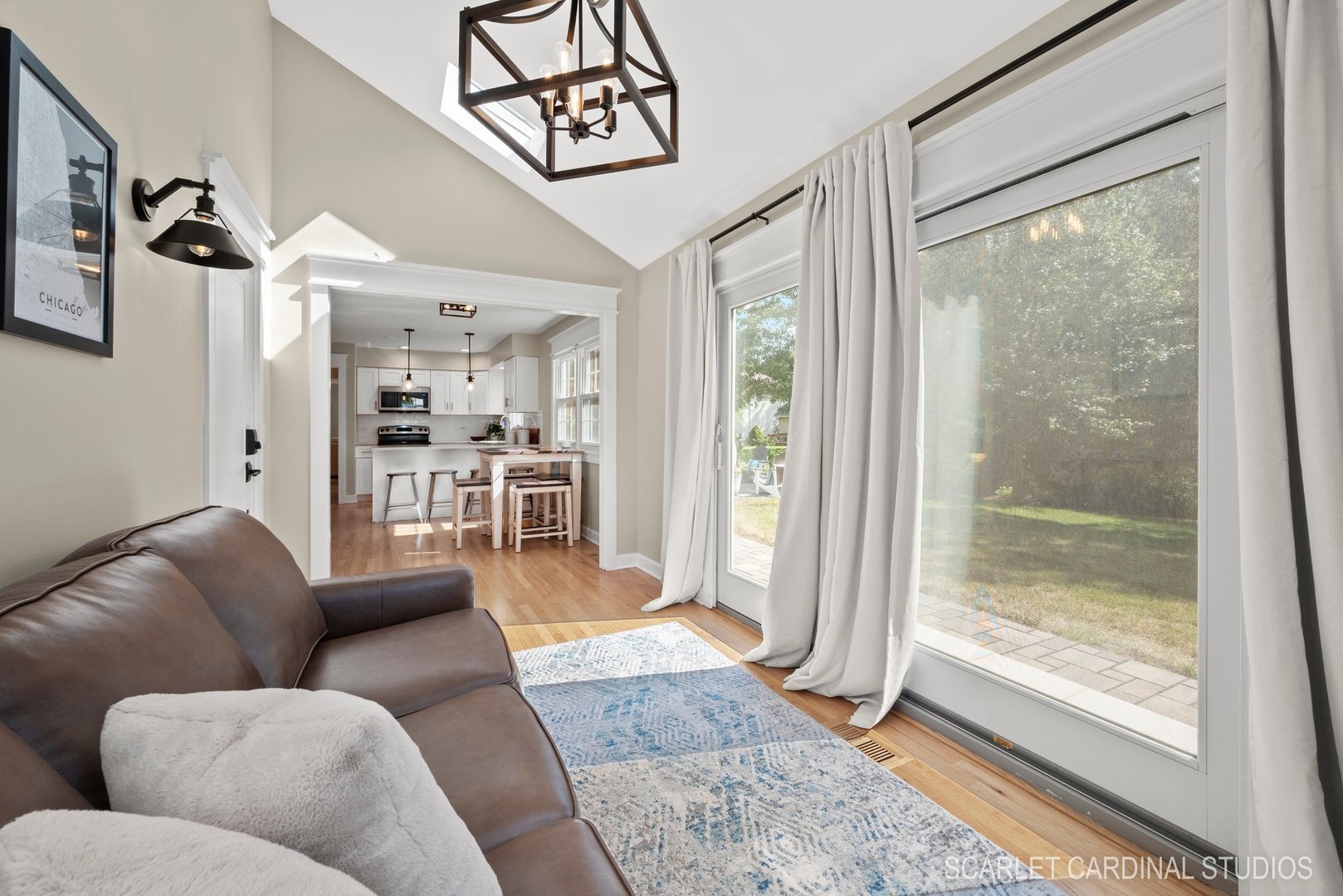 742 South River Road Naperville, IL 60540 - Photo 13 of 39 a living room with furniture and a floor to ceiling window