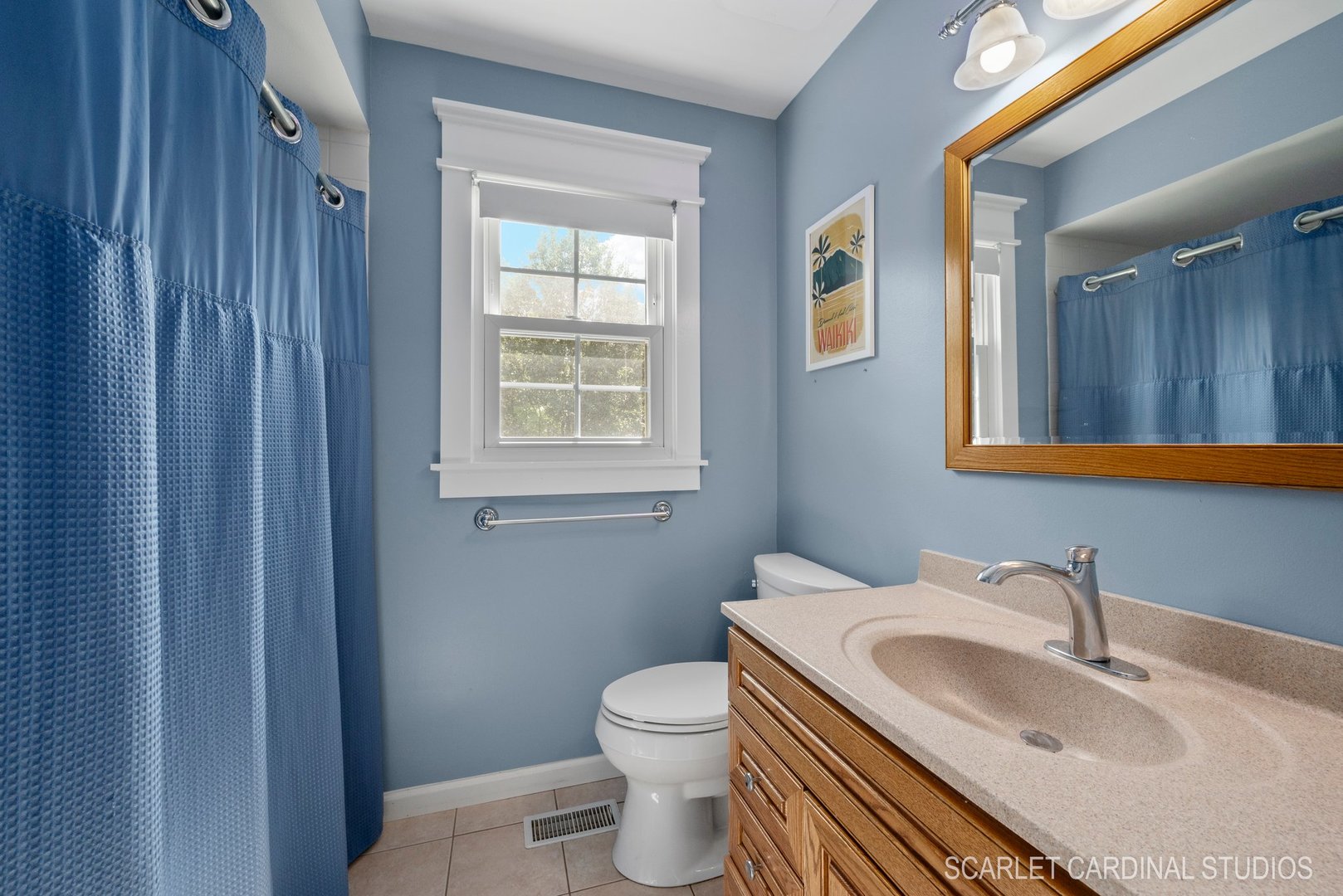 742 South River Road Naperville, IL 60540 - Photo 27 of 39 a bathroom with a sink a toilet and a mirror
