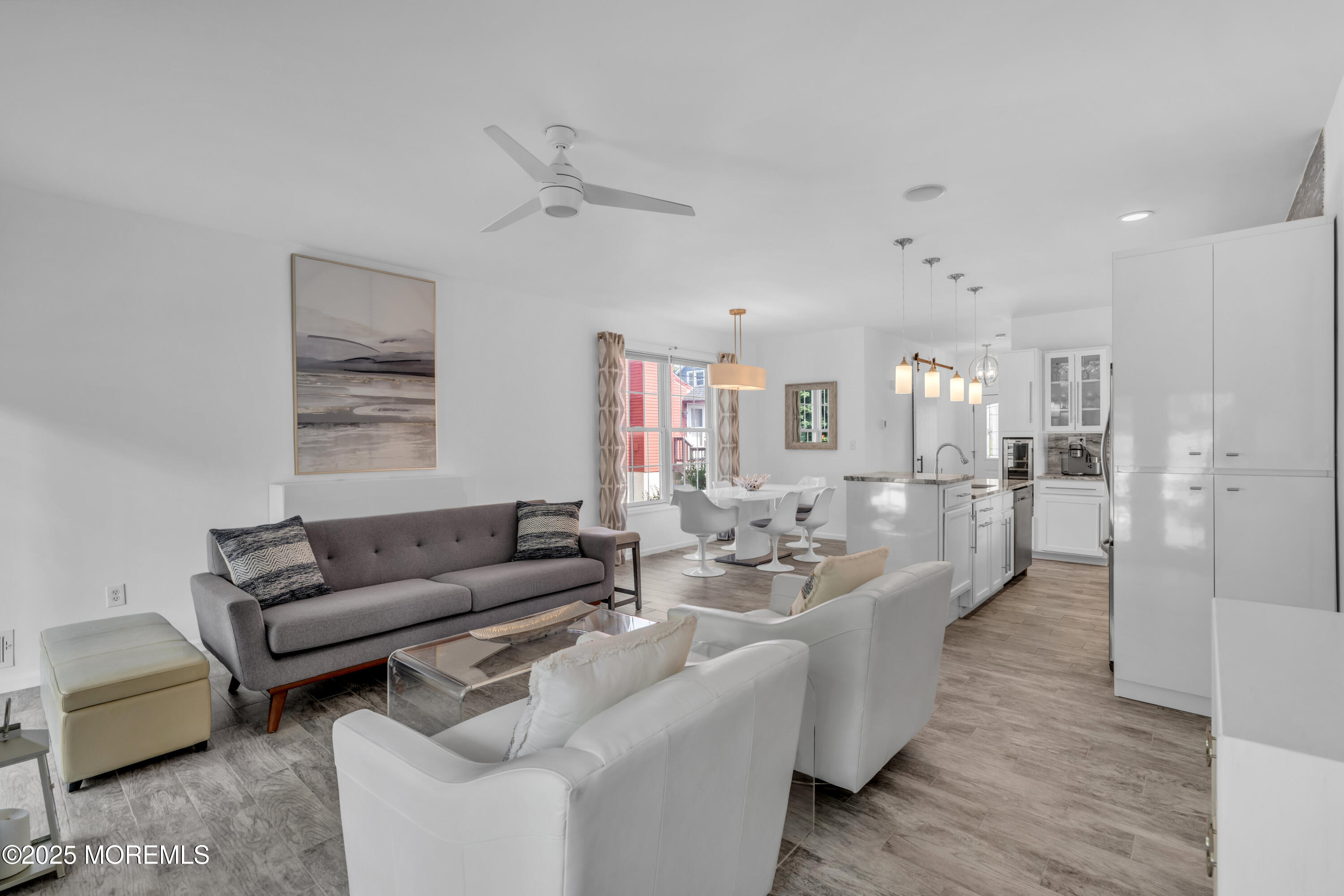 12 Locust Street Highlands, NJ 07732 - Photo 16 of 47 a living room with furniture and a wooden floor