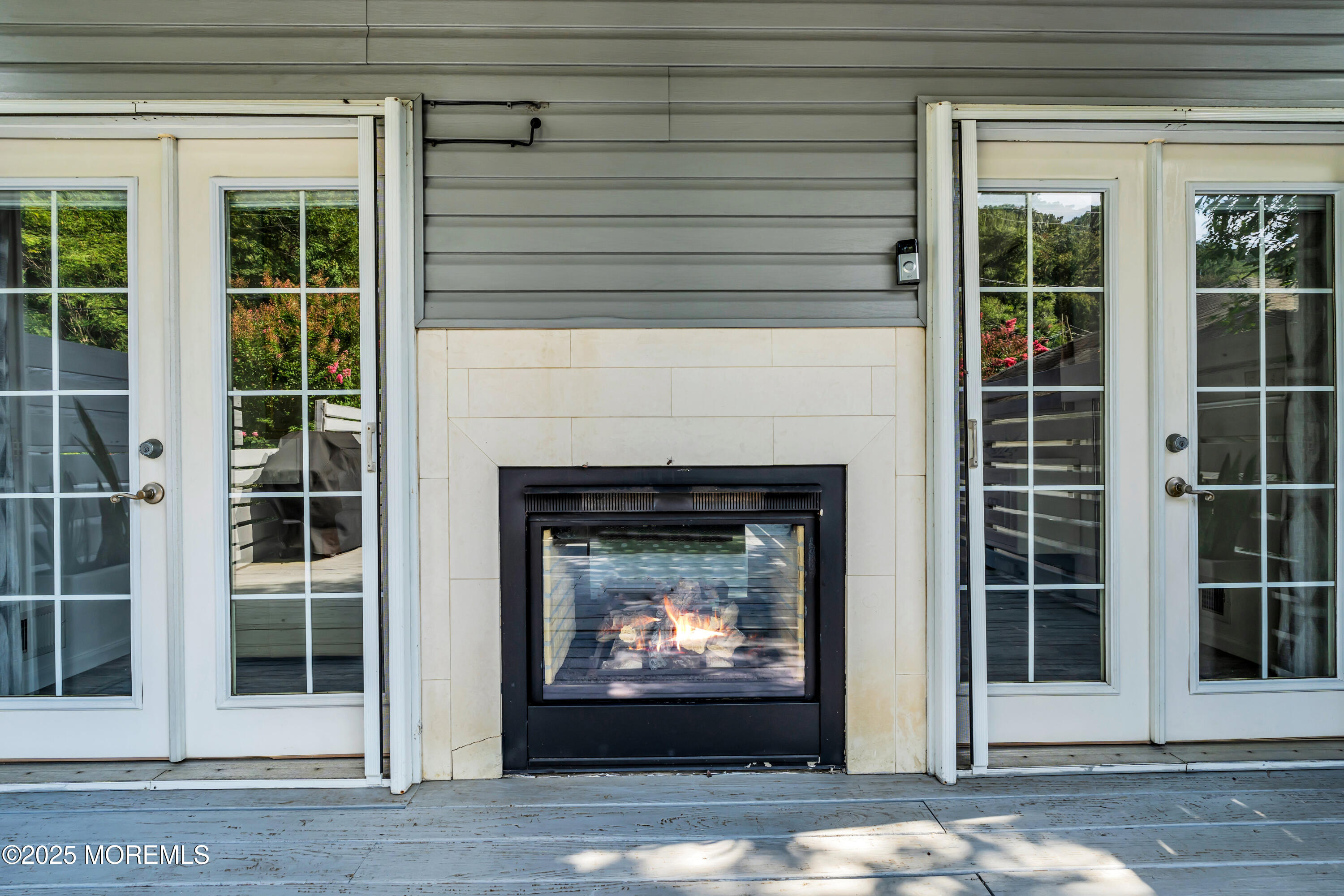 12 Locust Street Highlands, NJ 07732 - Photo 20 of 47 a living room with a fireplace