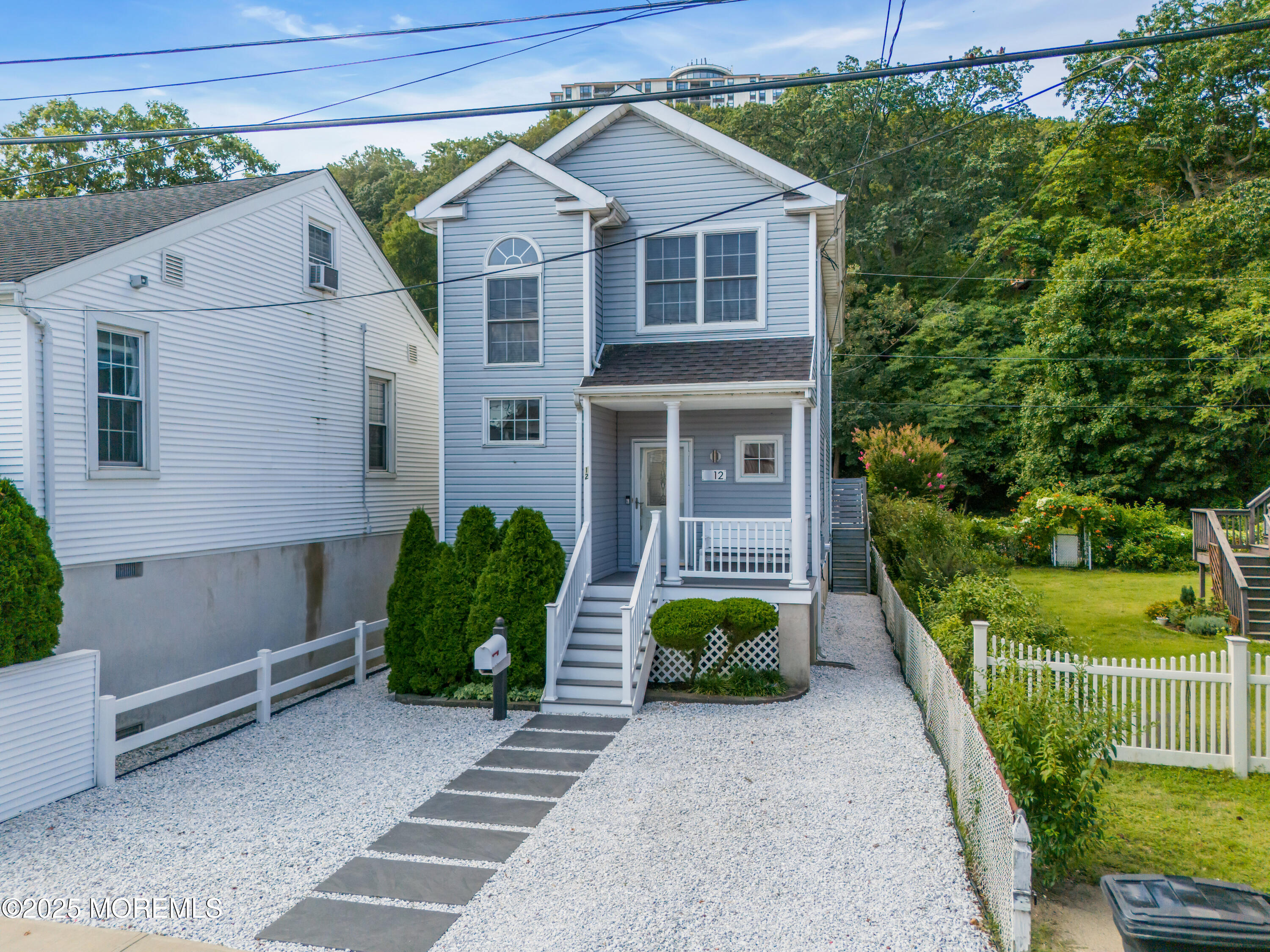 12 Locust Street Highlands, NJ 07732 - Photo 2 of 47 a view of a back yard of the house