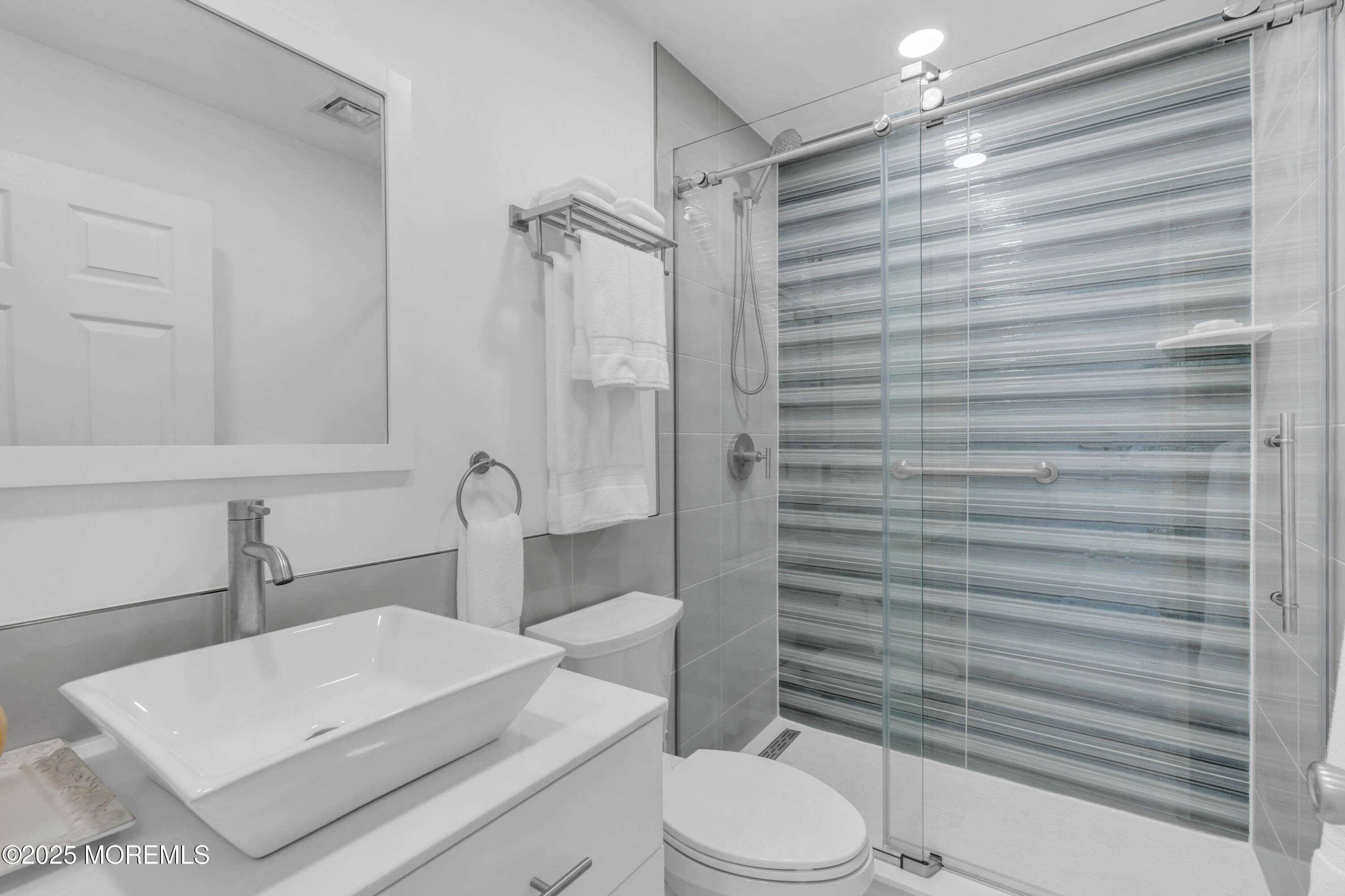 12 Locust Street Highlands, NJ 07732 - Photo 31 of 47 a bathroom with a toilet and a shower