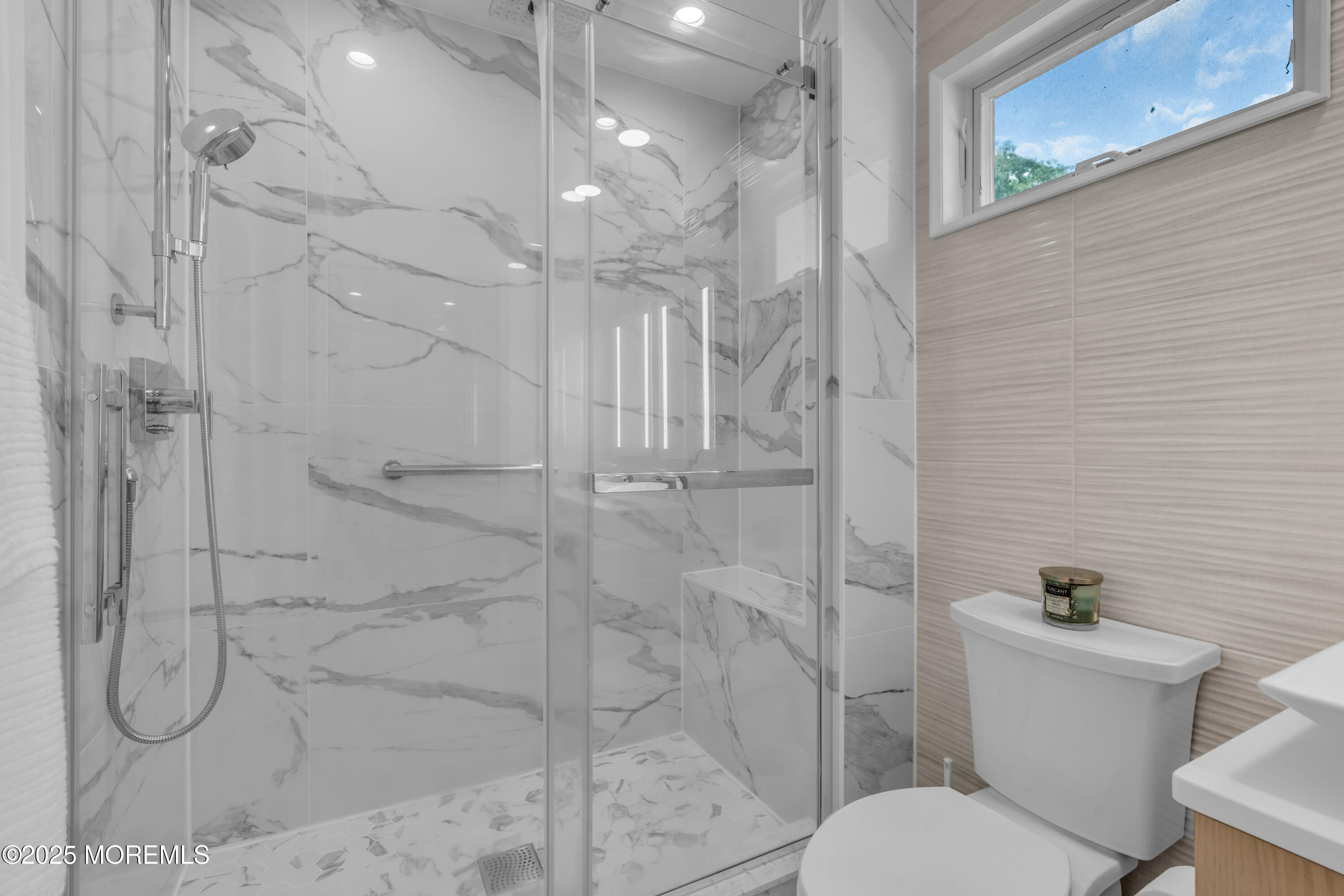 12 Locust Street Highlands, NJ 07732 - Photo 37 of 47 a bathroom with a toilet and shower