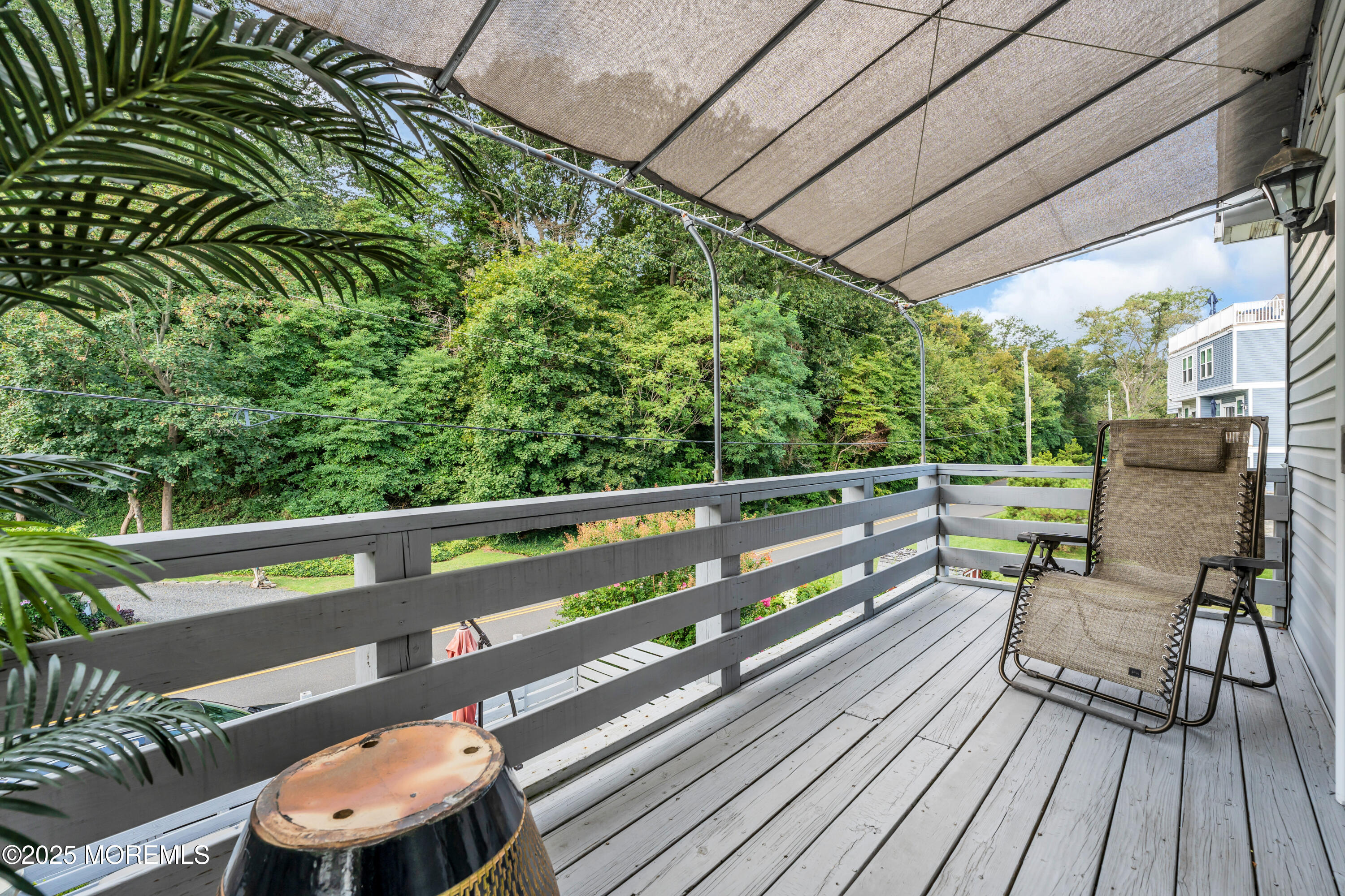 12 Locust Street Highlands, NJ 07732 - Photo 38 of 47 a view of two chairs in a balcony