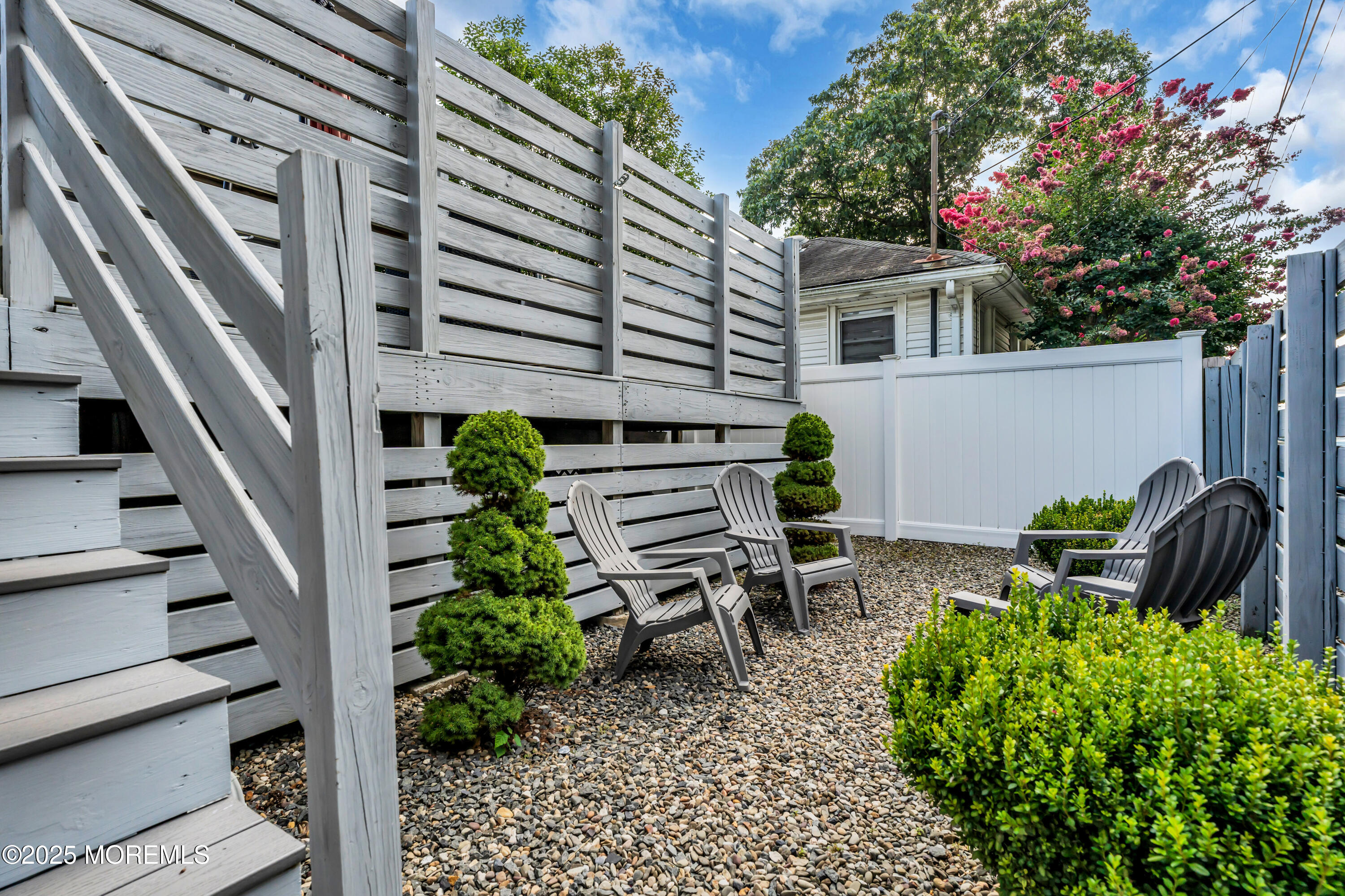 12 Locust Street Highlands, NJ 07732 - Photo 39 of 47 a backyard of a house with lots of green space