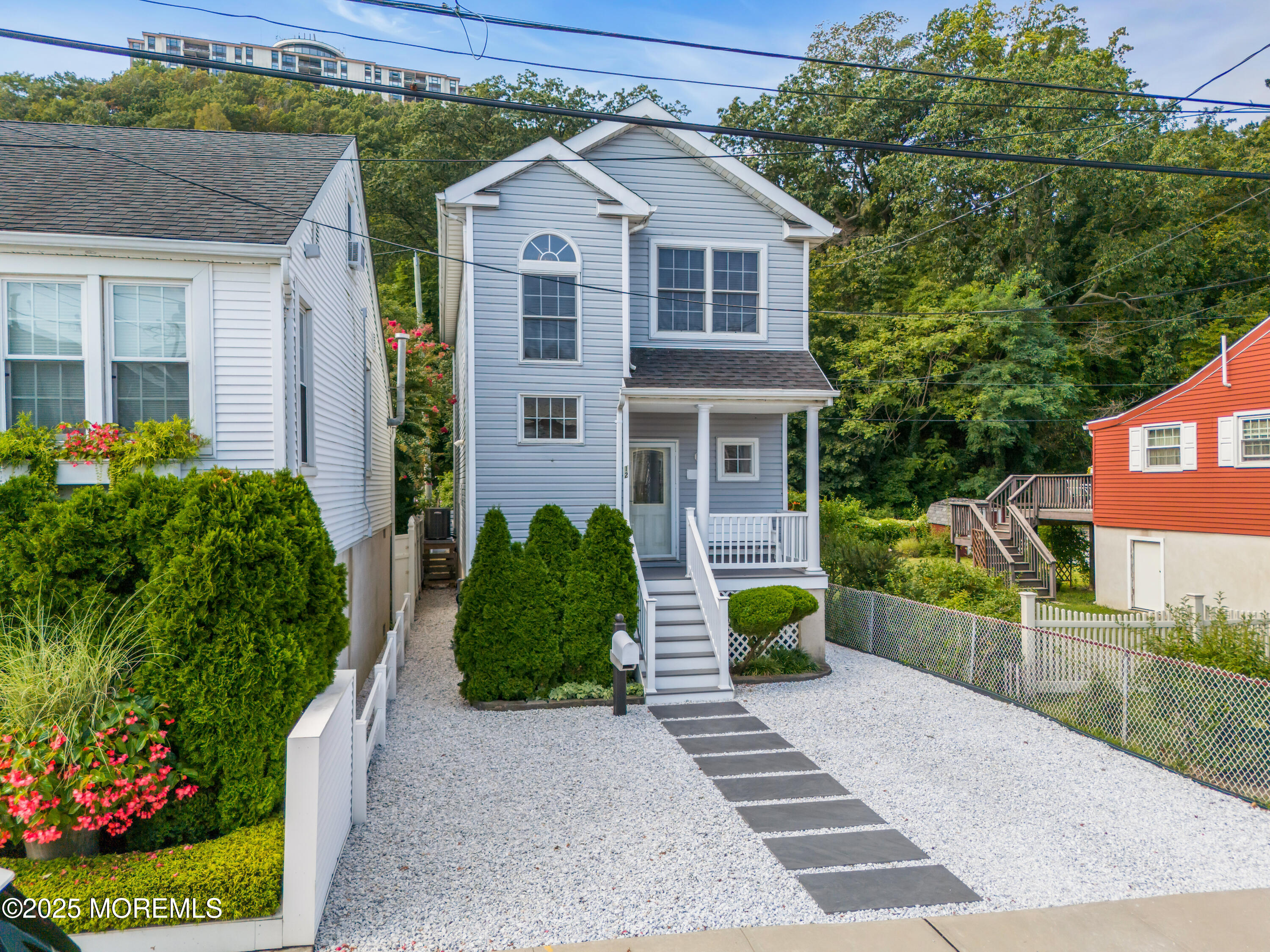 12 Locust Street Highlands, NJ 07732 - Photo 4 of 47 a front view of a house with garden