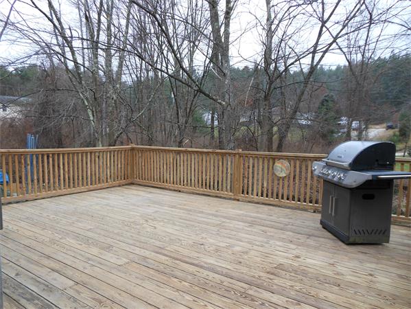 29 Stafford Road Monson, MA 01057 - Photo 11 of 14 a view of deck and trees with wooden fence