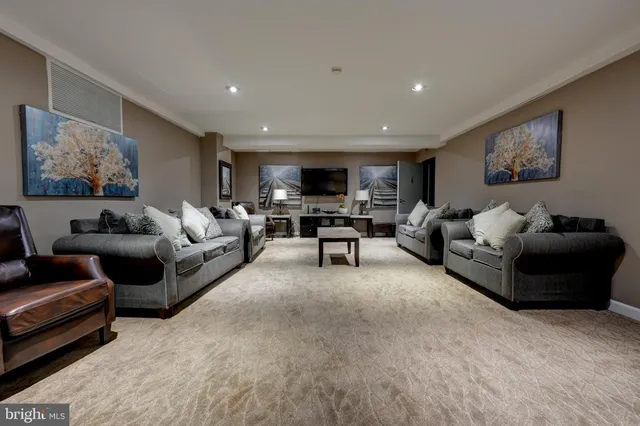 a living room with furniture and a couch