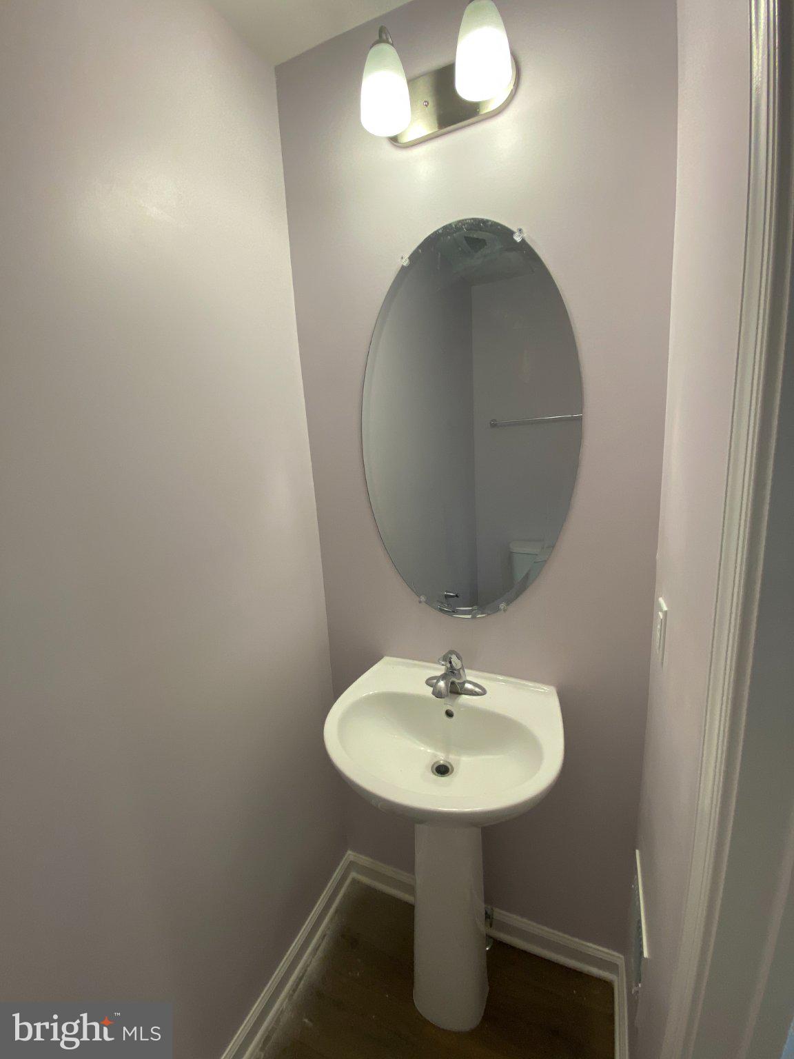 128 Tuxford Road Falling Waters, WV 25419 - Photo 14 of 27 Charming powder room with modern flair.