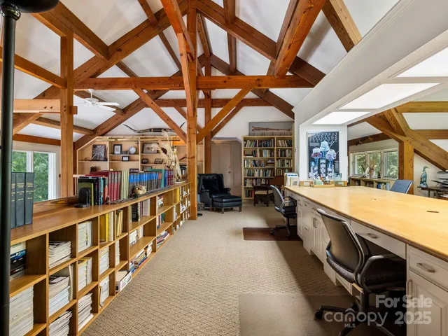 a view of an chairs and table in the balcony