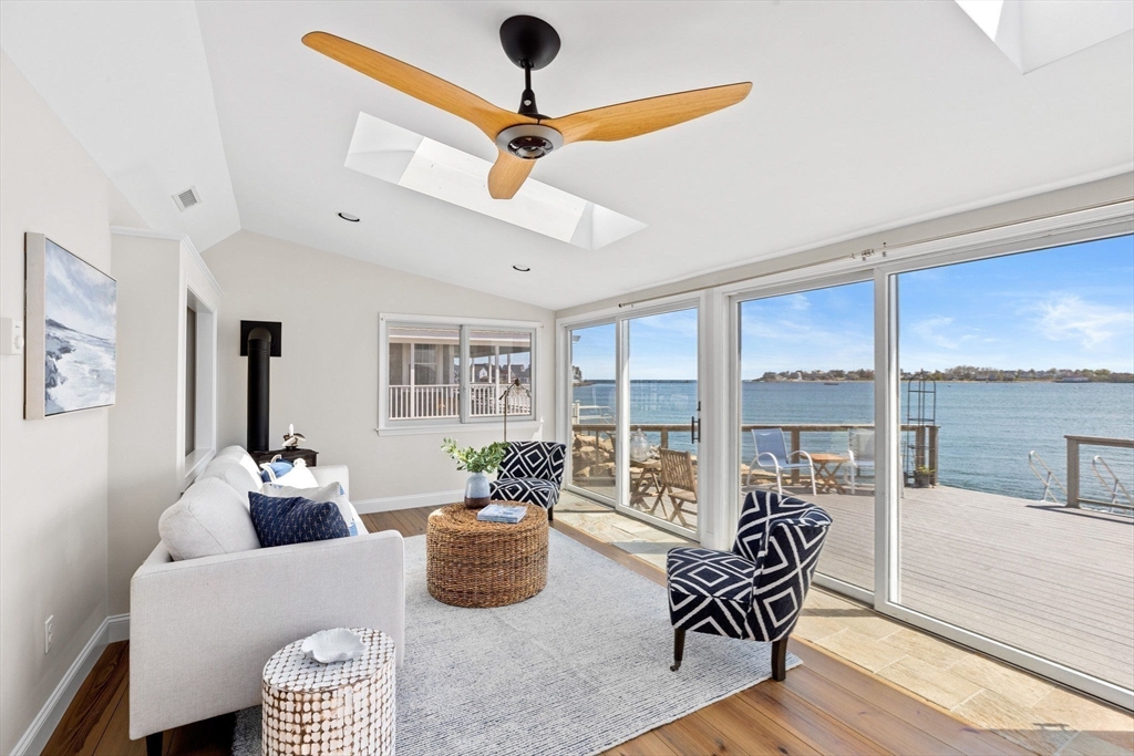 30 Lighthouse Road Scituate, MA 02066 - Photo 15 of 36 a living room with furniture and a large window