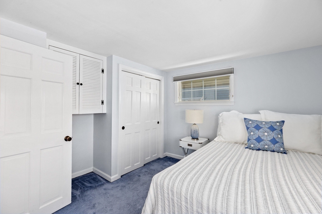 30 Lighthouse Road Scituate, MA 02066 - Photo 25 of 36 a bedroom with a bed and a window
