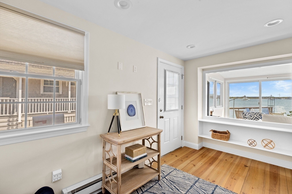 30 Lighthouse Road Scituate, MA 02066 - Photo 7 of 36 a living room with furniture and a window