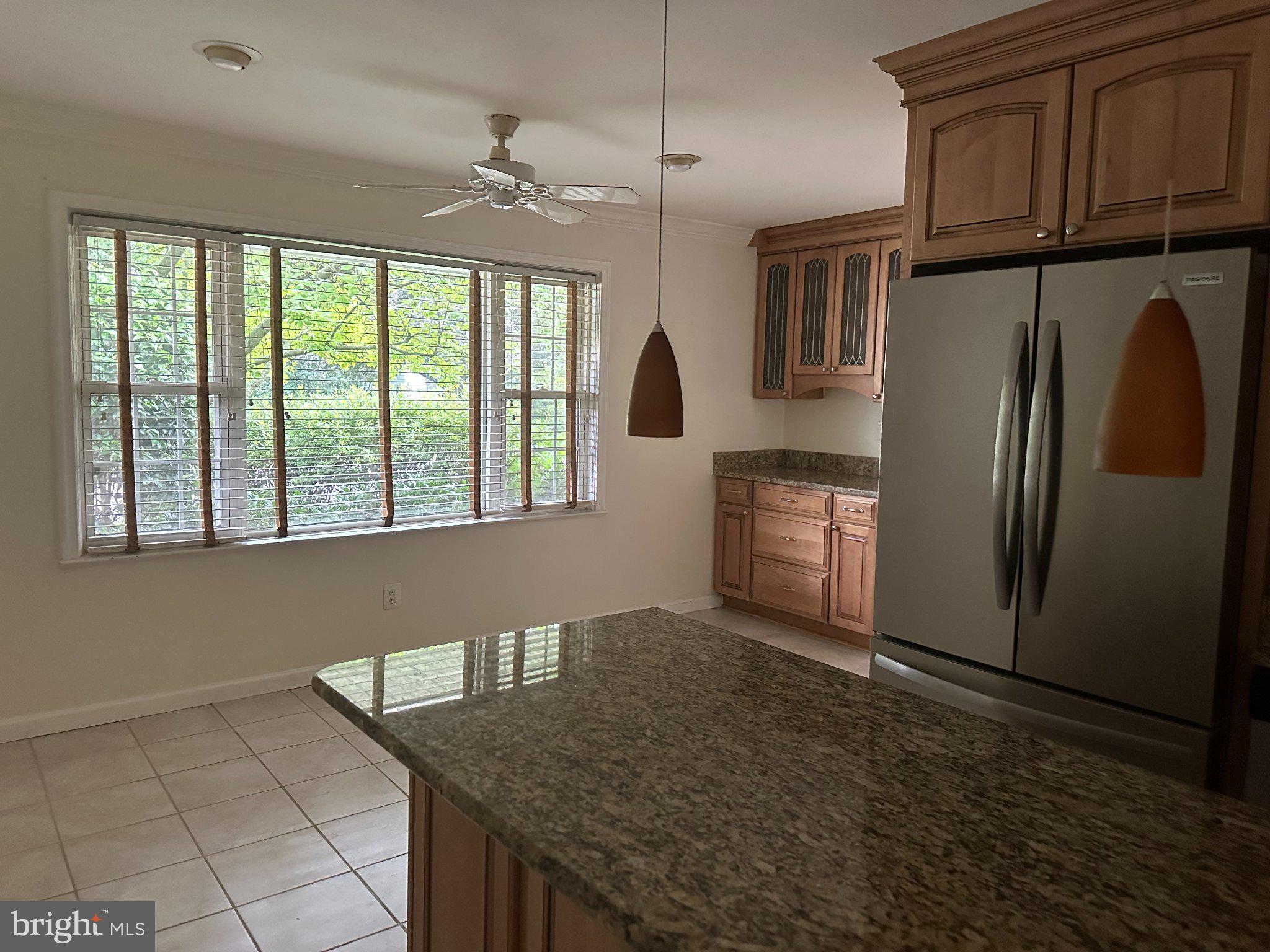 2505 Rocky Branch Road Vienna, VA 22181 - Photo 6 of 11 Bright kitchen with serene views.