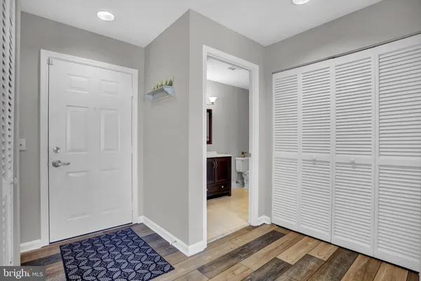 a view of hallway with washer and dryer