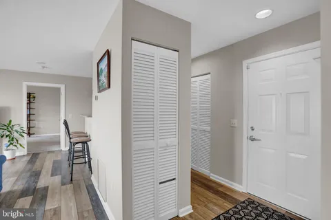 a very nice looking hallway with a carpet