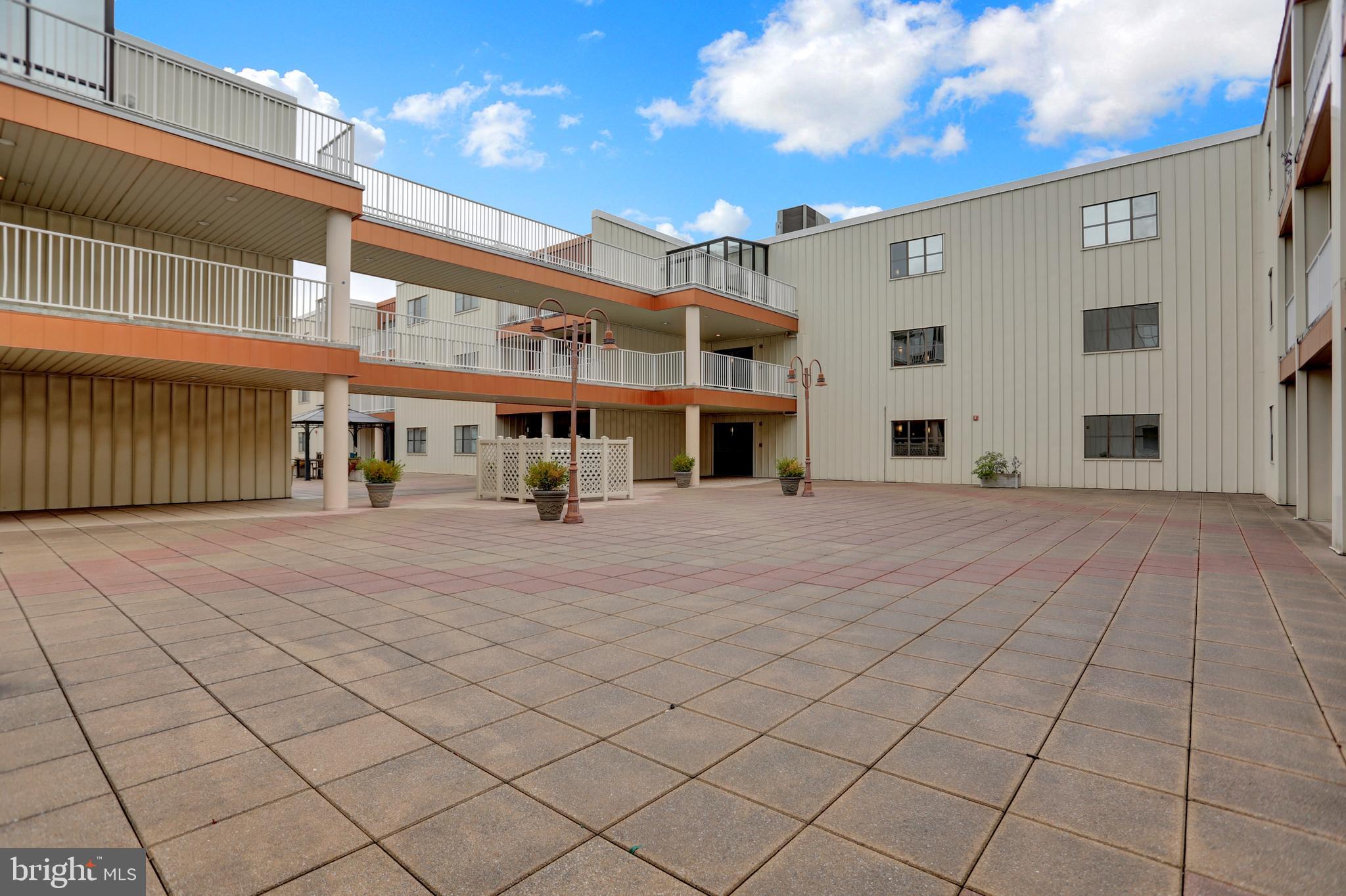2702 Lighthouse Point East, Unit 532 Baltimore, MD 21224 - Photo 29 of 66 Courtyard