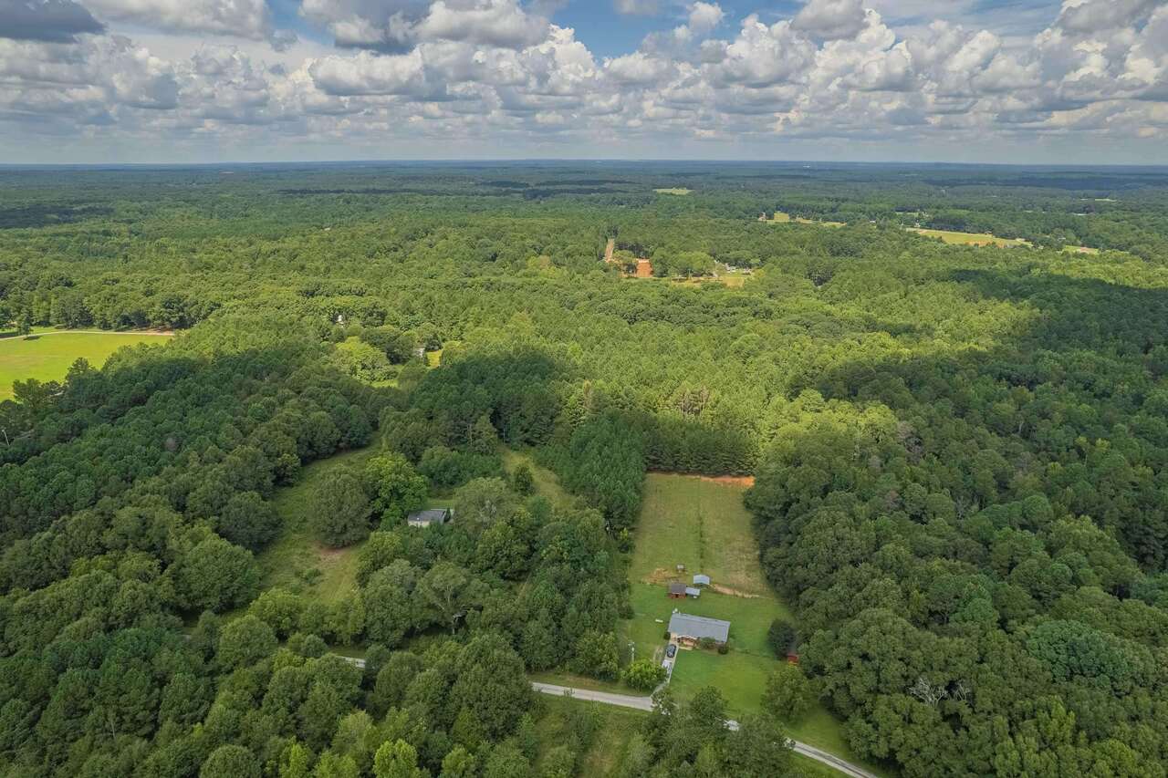 0 Old Baccus Road Monroe, GA 30656 - Photo 1 of 1 a view of a lake with a yard