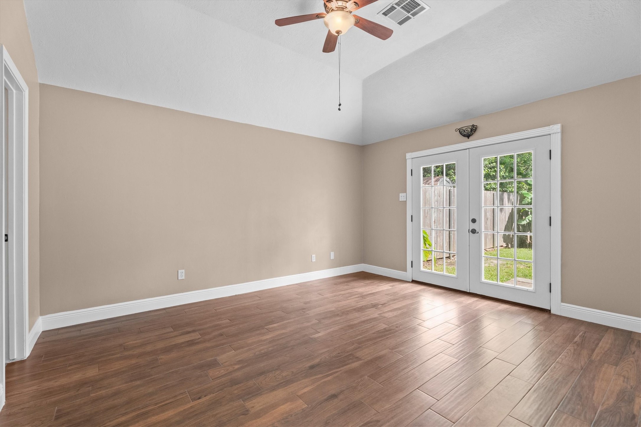 5010 Deer Point Drive Spring, TX 77389 - Photo 8 of 32 Large primary bedroom with french doors to the backyard
