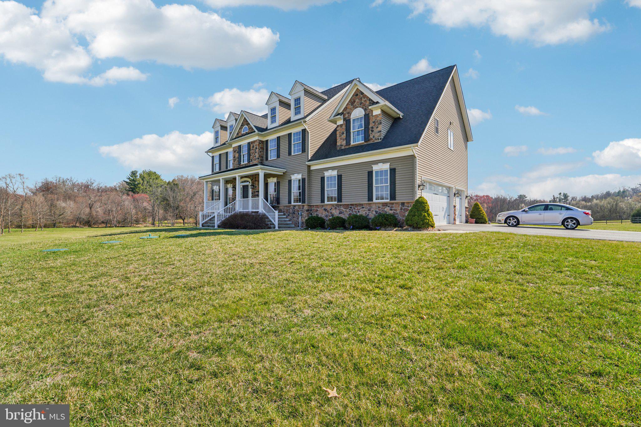 13936 Rover Mill Road West Friendship, MD 21794 - Photo 2 of 73 a front view of a house with garden