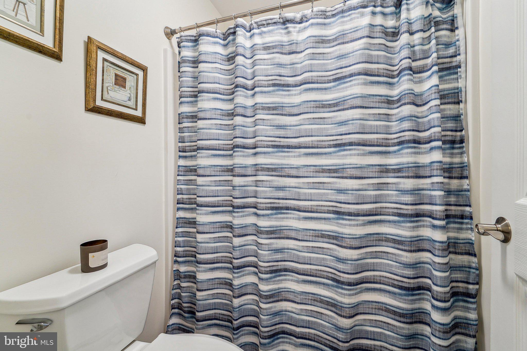 13936 Rover Mill Road West Friendship, MD 21794 - Photo 30 of 73 a bathroom with a bathtub and shower