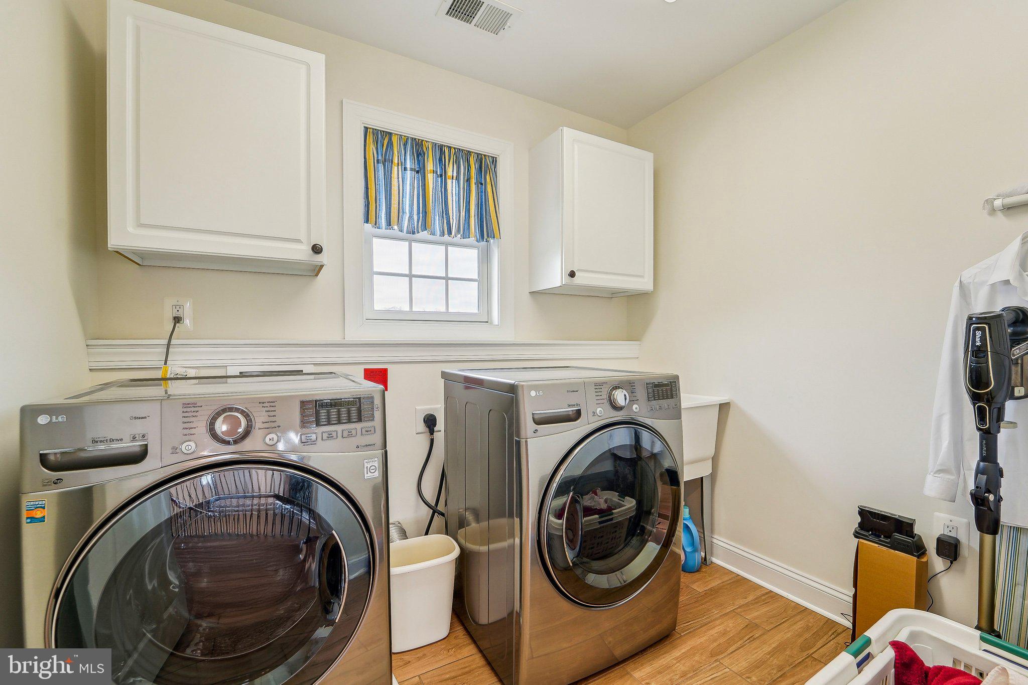 13936 Rover Mill Road West Friendship, MD 21794 - Photo 34 of 73 a utility room with dryer and washer