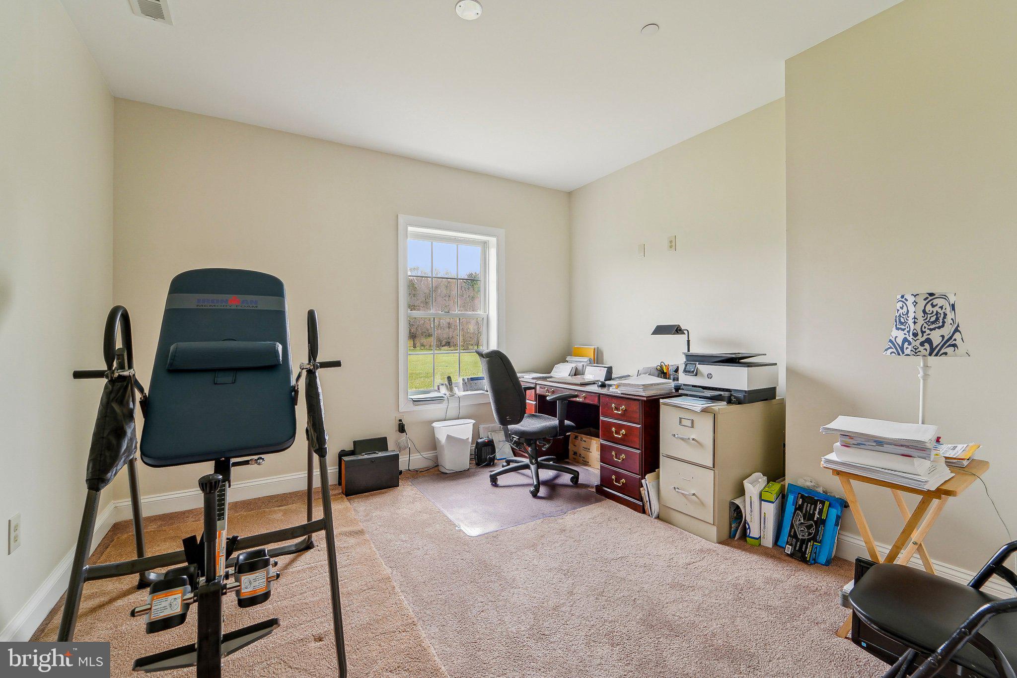 13936 Rover Mill Road West Friendship, MD 21794 - Photo 36 of 73 a view of a workspace with furniture and a window