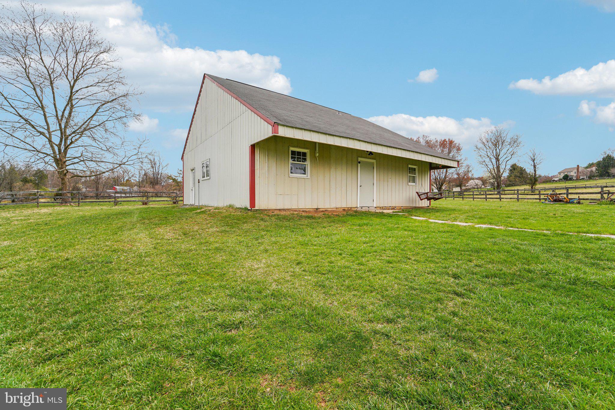 13936 Rover Mill Road West Friendship, MD 21794 - Photo 53 of 73 a view of a house with a yard and garage